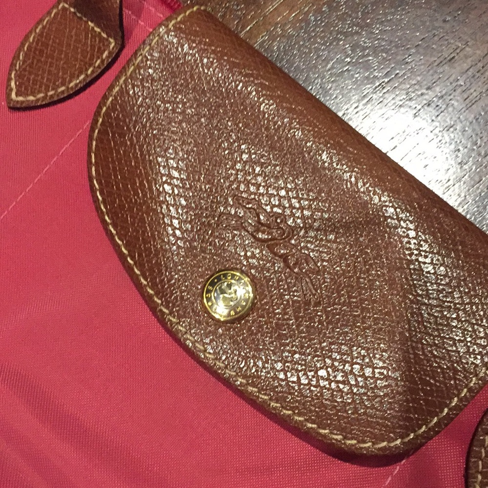 Pink purse size Longchamp bag